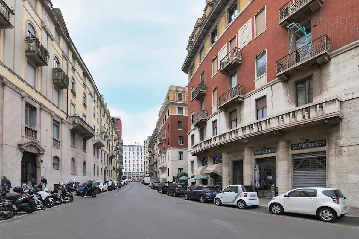 Light and Style in the Heart of Milan Apartment