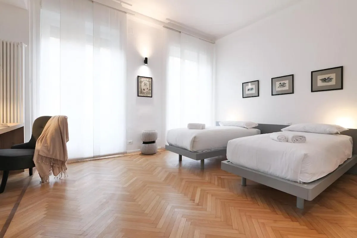 Light and Style in the Heart of Milan Apartment